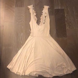 Tan dress with crossing lace straps